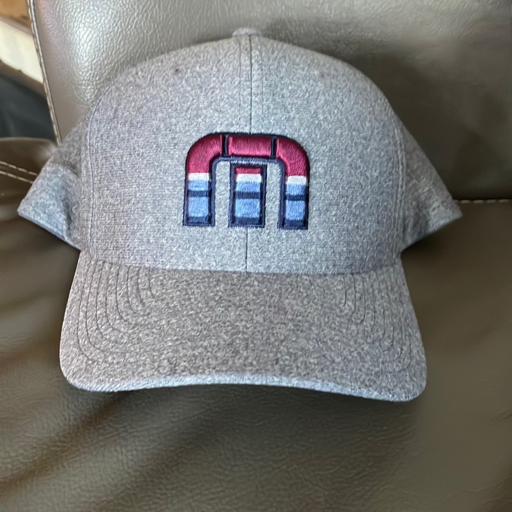 Travis Mathew flex fit gray hat.  Never worn.